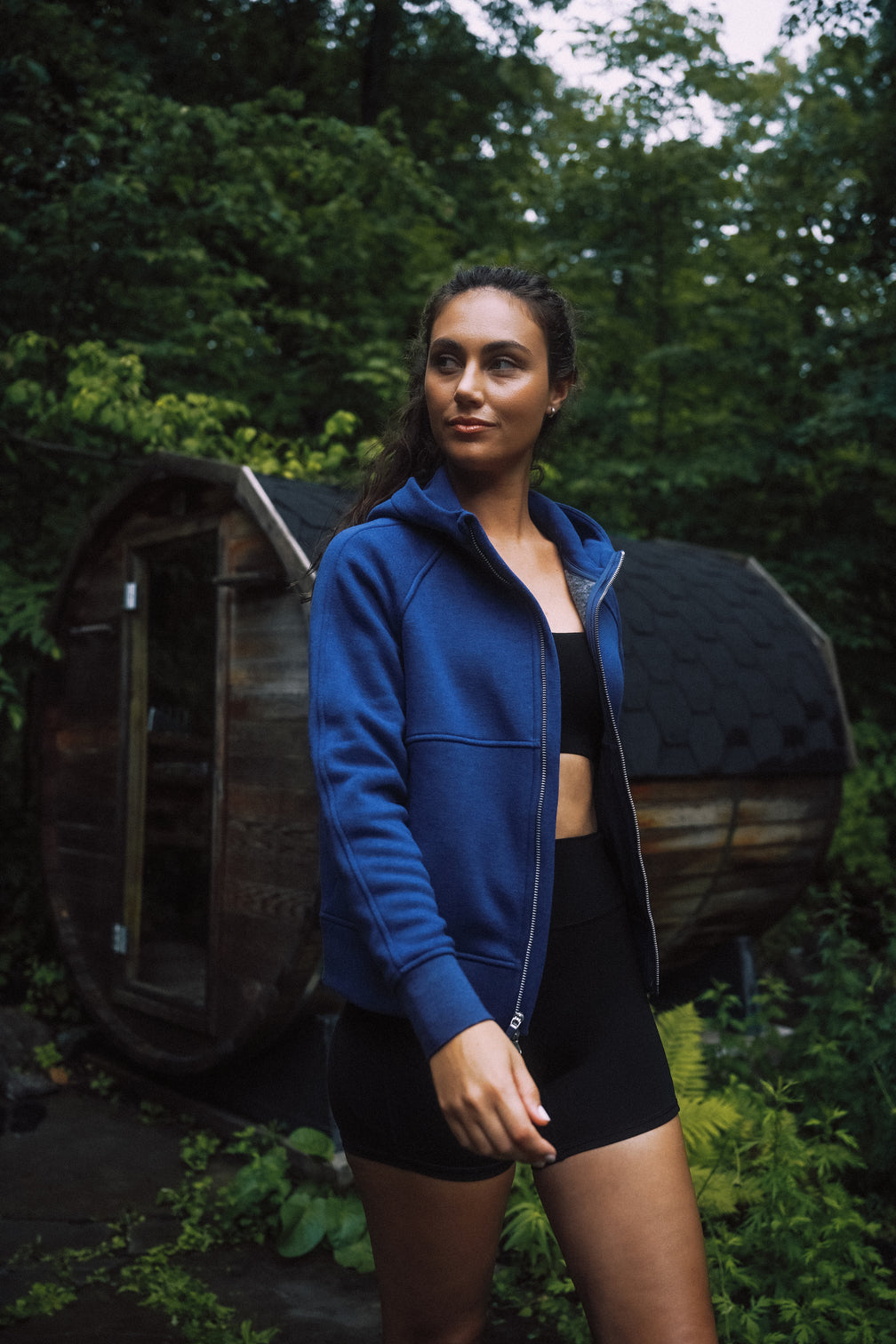 Woman stretching in a quarter-zip