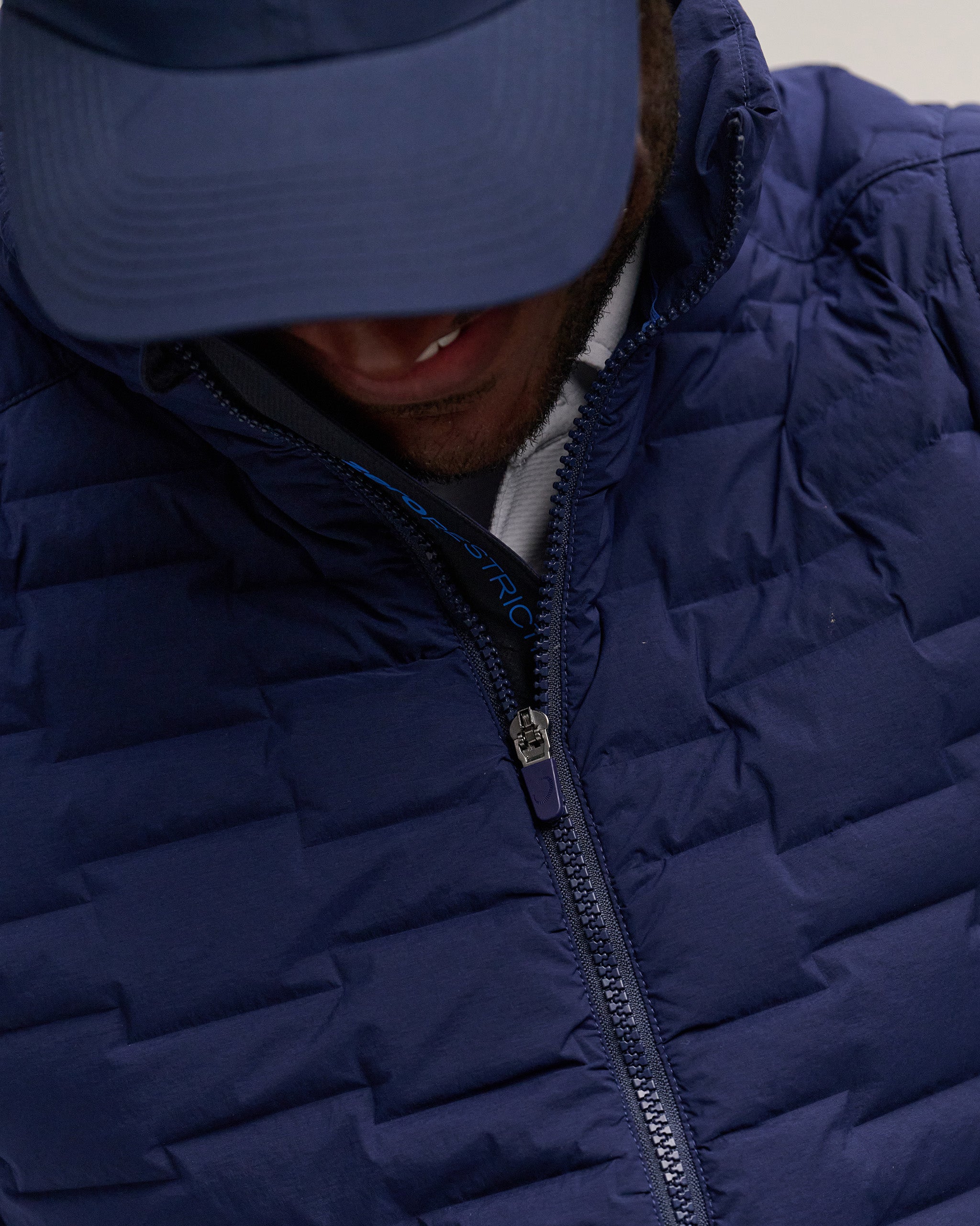 Future Down Golf Vest | Zero Restriction